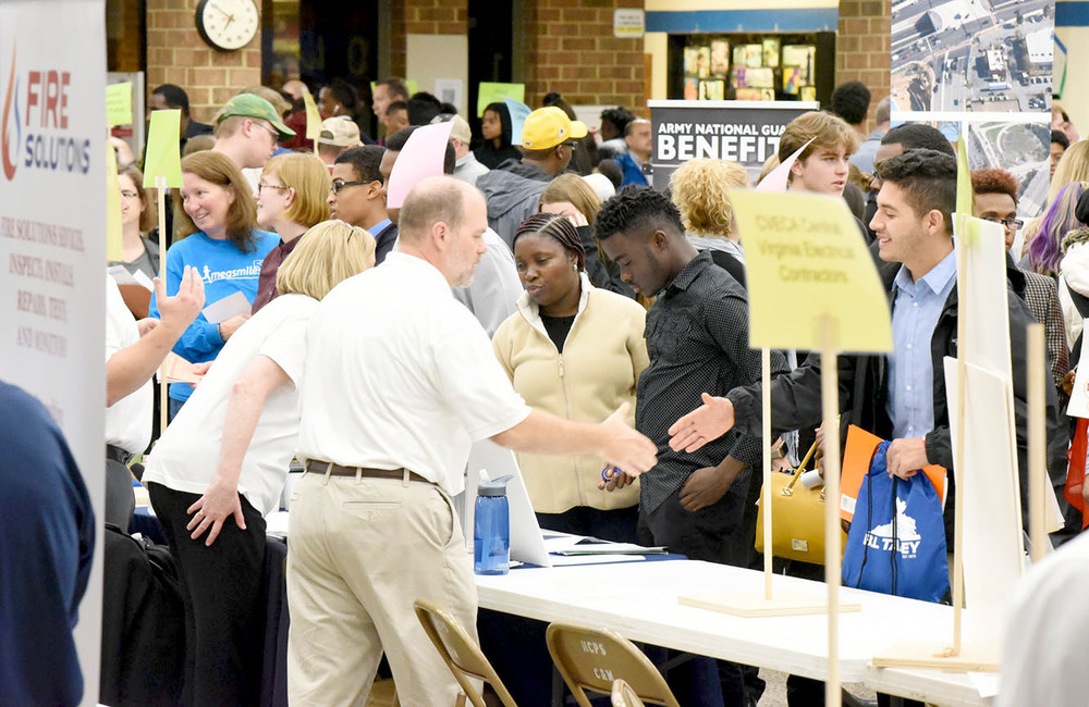 Students and families talk with representatives of businesses, government agencies, branches of the military and other employers at Henrico County Public Schools’ 2019 Life-Ready Expo. The 2022 edition of the event will be held Oct. 18 at Hermitage High School